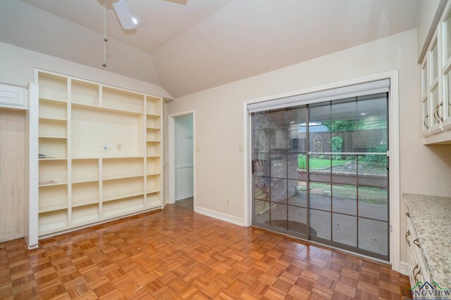 315 Tealwood Dr, Longview, TX 75605 - spare room featuring ceiling fan and vaulted ceiling