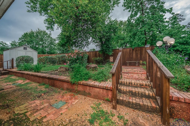 315 Tealwood Dr, Longview, TX 75605 - fenced backyard featuring a shed