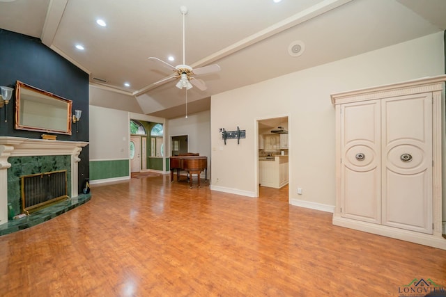 315 Tealwood Dr, Longview, TX 75605 - unfurnished living room featuring ceiling fan, light wood-type flooring, recessed lighting, and a premium fireplace