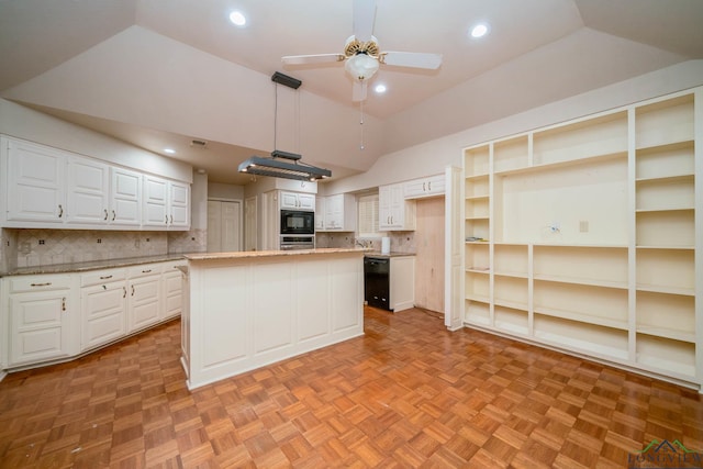 315 Tealwood Dr, Longview, TX 75605 - kitchen with lofted ceiling, black appliances, ceiling fan, white cabinets, and backsplash