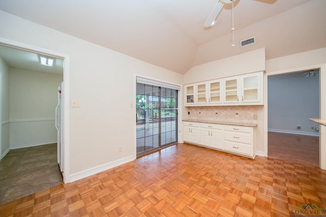 315 Tealwood Dr, Longview, TX 75605 - spare room with a ceiling fan and high vaulted ceiling