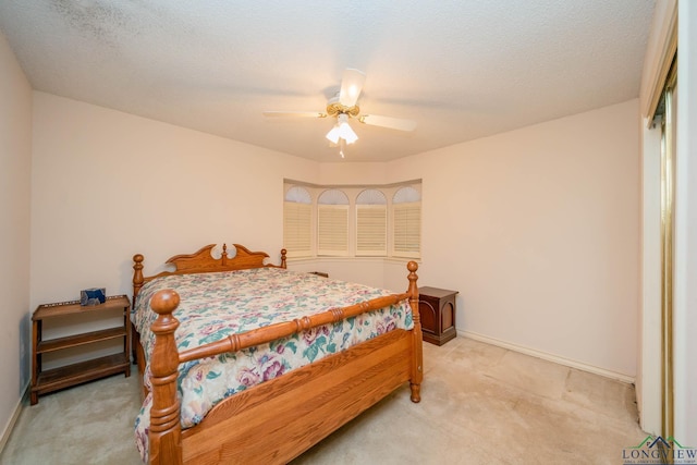 315 Tealwood Dr, Longview, TX 75605 - bedroom featuring light carpet and a ceiling fan