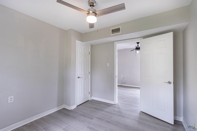 524 N College St, Lindale, TX 75771 - unfurnished bedroom featuring light wood-style floors and ceiling fan
