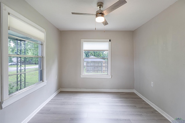 524 N College St, Lindale, TX 75771 - spare room featuring plenty of natural light and light wood finished floors