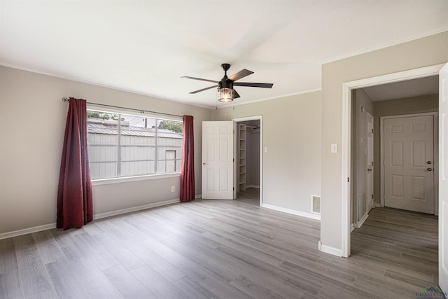 524 N College St, Lindale, TX 75771 - unfurnished room with ceiling fan, wood finished floors, and crown molding