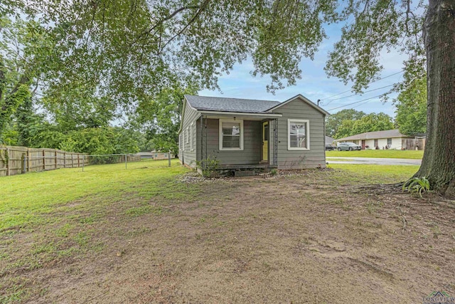 524 N College St, Lindale, TX 75771 - view of front of house featuring roof with shingles