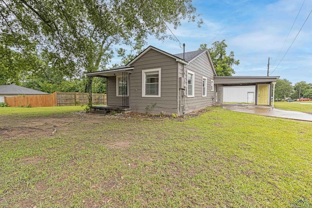 524 N College St, Lindale, TX 75771 - view of front of property featuring an attached carport and concrete driveway