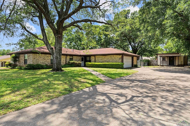ranch-style home featuring a front lawn, a garage, brick siding, aphalt driveway, and fence