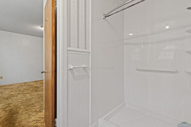bathroom featuring a textured ceiling
