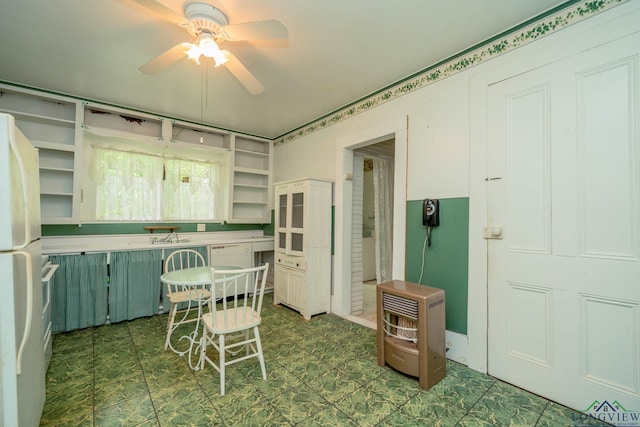 508 N Soda St, Jefferson, TX 75657 - kitchen featuring ceiling fan, open shelves, white appliances, a sink, and tile patterned floors
