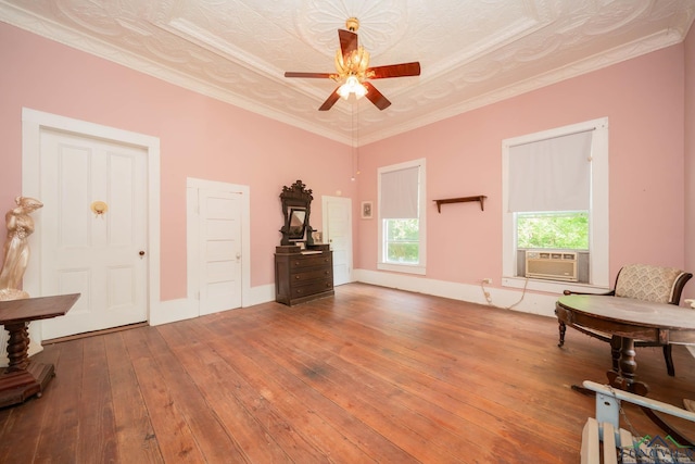 508 N Soda St, Jefferson, TX 75657 - living area featuring hardwood / wood-style flooring, ceiling fan, ornamental molding, and cooling unit