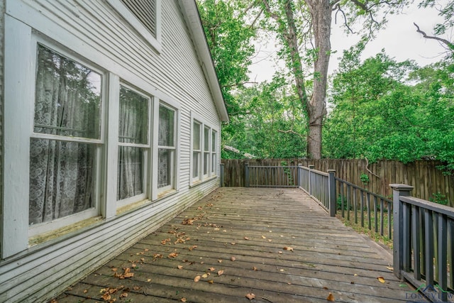 508 N Soda St, Jefferson, TX 75657 - wooden deck with a fenced backyard