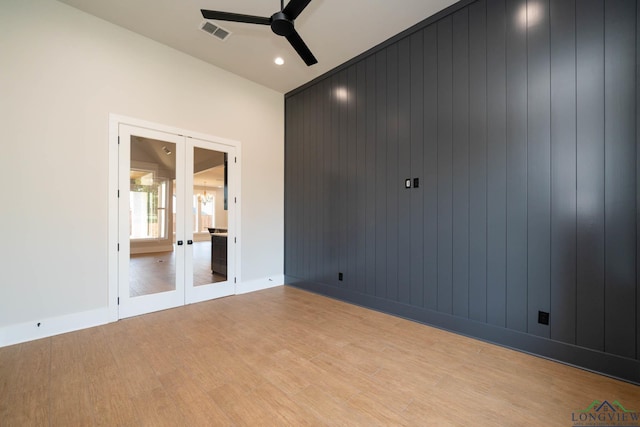 unfurnished room with recessed lighting, visible vents, a ceiling fan, french doors, and light wood-style flooring