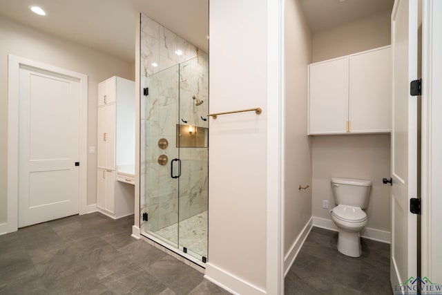 bathroom featuring recessed lighting, a shower stall, toilet, and baseboards