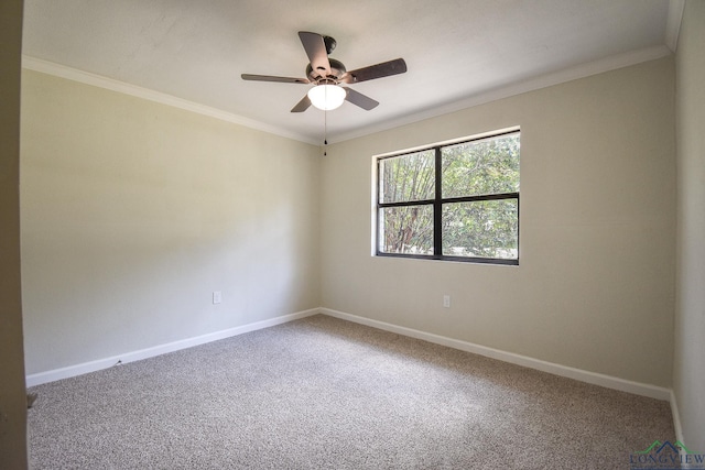 unfurnished room with crown molding, carpet floors, and ceiling fan