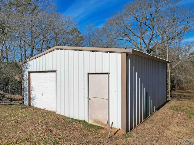 view of outbuilding with an outdoor structure