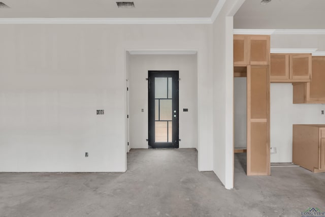 interior space with crown molding