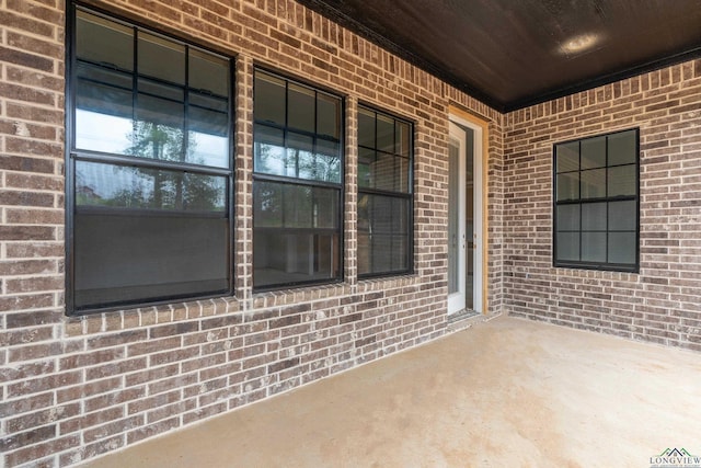 view of patio featuring a porch