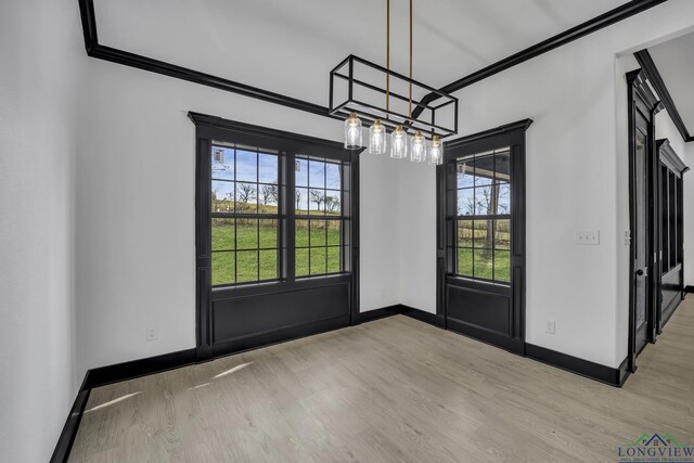 spare room with a tray ceiling