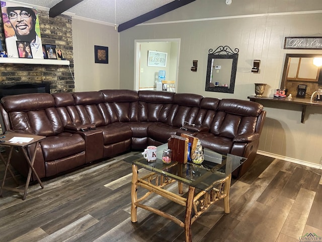 509 Pinewood Dr, Marshall, TX 75672 - living area with crown molding, dark wood-style flooring, and a stone fireplace