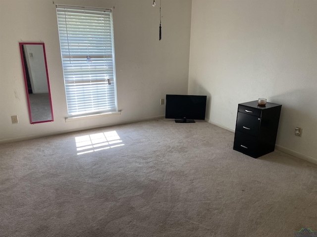 509 Pinewood Dr, Marshall, TX 75672 - empty room with carpet floors and baseboards