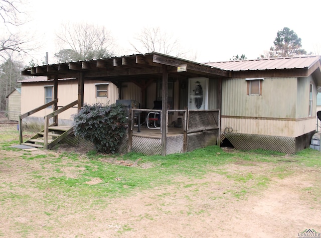 exterior space with metal roof