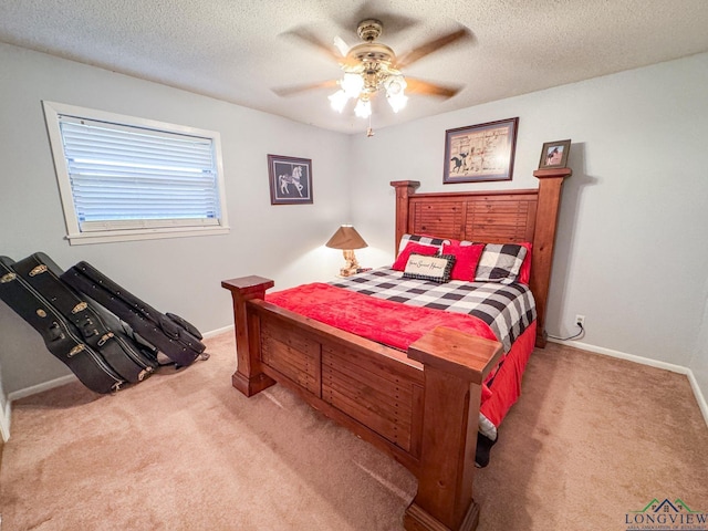 1226 County Road 1896, Linden, TX 75563 - bedroom with carpet, a ceiling fan, and a textured ceiling