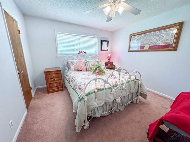 1226 County Road 1896, Linden, TX 75563 - carpeted bedroom featuring a textured ceiling and ceiling fan