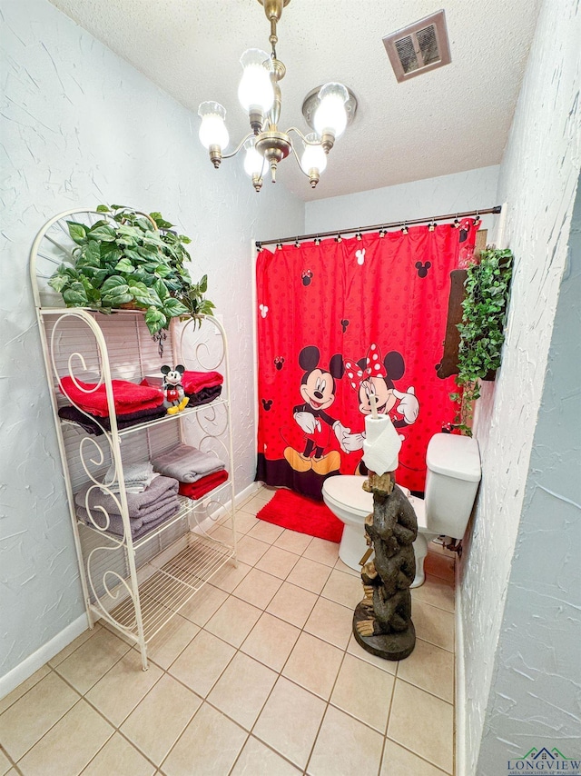 1226 County Road 1896, Linden, TX 75563 - full bathroom with a textured ceiling, a chandelier, tile patterned flooring, a textured wall, and curtained shower