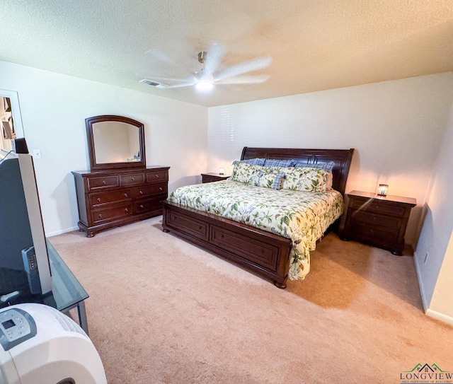 1226 County Road 1896, Linden, TX 75563 - bedroom featuring light colored carpet, ceiling fan, and a textured ceiling