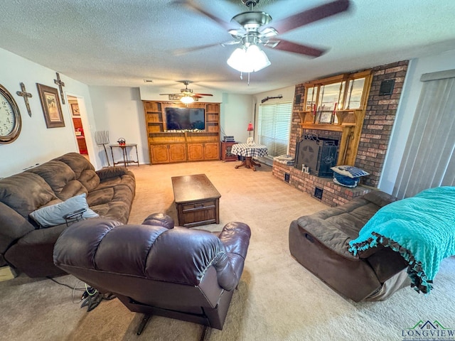 1226 County Road 1896, Linden, TX 75563 - living room featuring carpet floors, a brick fireplace, a textured ceiling, and a ceiling fan
