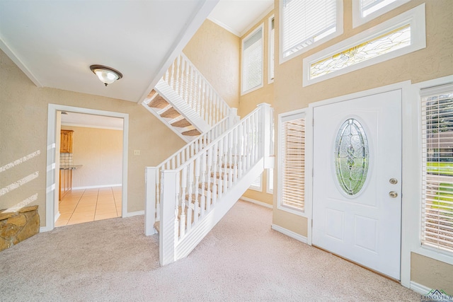 1822 Northwood Ct, Longview, TX 75604 - carpeted foyer with stairs and baseboards