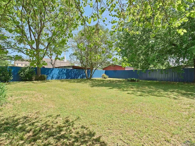 view of yard featuring a fenced backyard