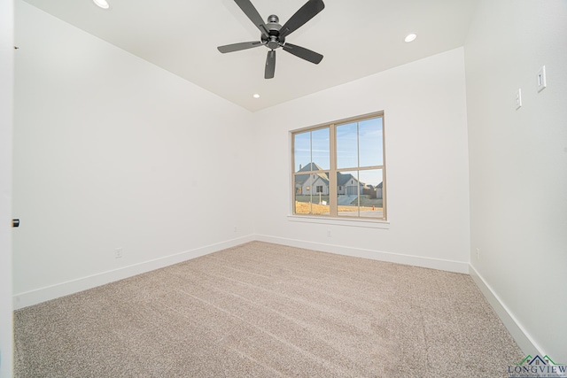 empty room with carpet and ceiling fan