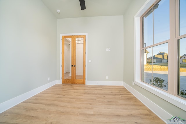 spare room with light wood-type flooring