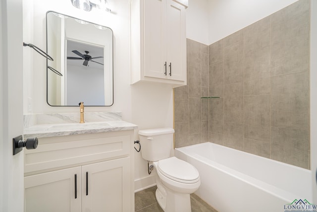 full bathroom featuring tile patterned flooring, vanity, toilet, ceiling fan, and bathtub / shower combination