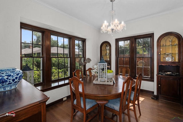 dining space featuring dark hardwood / wood-style floors, a wood stove, crown molding, and a chandelier