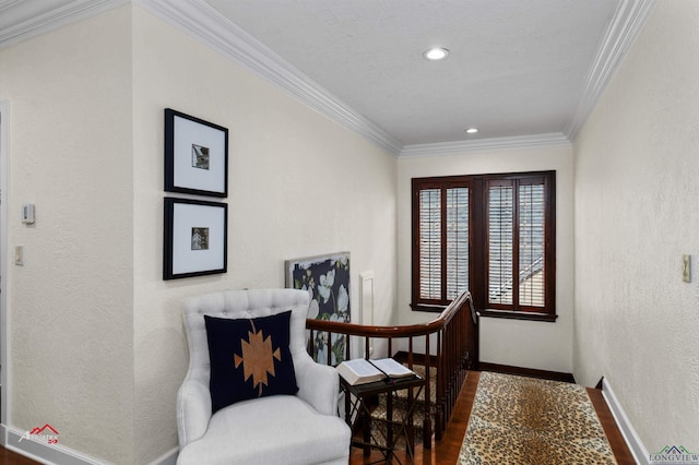 sitting room featuring crown molding, dark hardwood / wood-style flooring, and a textured ceiling