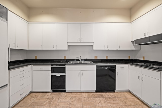 kitchen with dishwasher, white cabinets, sink, gas stovetop, and white fridge