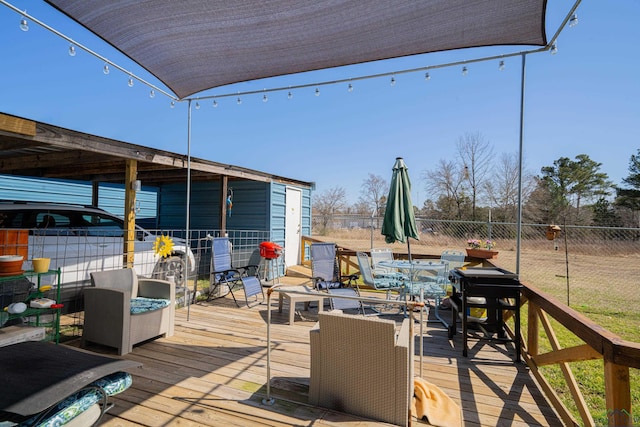 wooden deck featuring fence