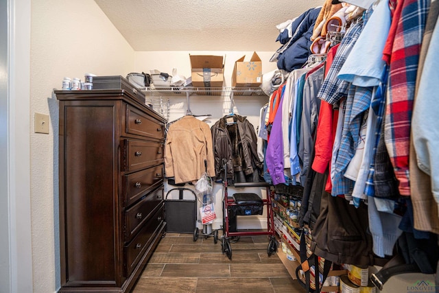 spacious closet with wood tiled floor