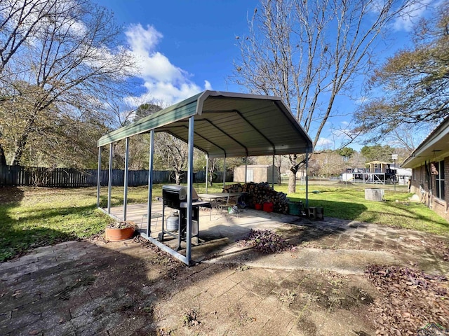 1400 Shreveport St, Elysian Fields, TX 75642 - view of parking / parking lot featuring a carport