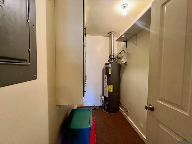 1400 Shreveport St, Elysian Fields, TX 75642 - utility room featuring water heater and electric panel