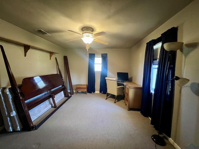 1400 Shreveport St, Elysian Fields, TX 75642 - office space with a ceiling fan and light carpet