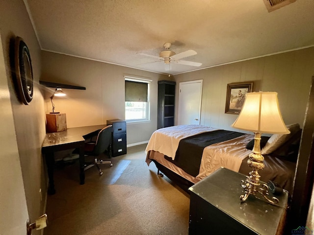 bedroom with ceiling fan and ornamental molding