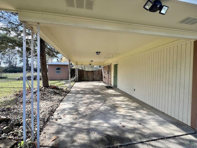 view of patio / terrace with a storage unit