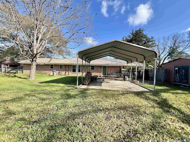 1400 Shreveport St, Elysian Fields, TX 75642 - view of yard featuring a carport