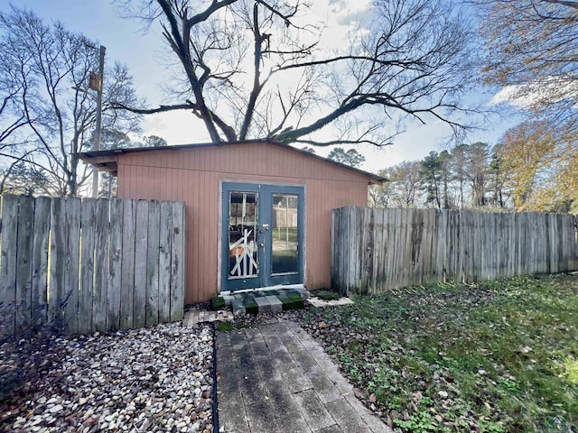 1400 Shreveport St, Elysian Fields, TX 75642 - view of outdoor structure featuring french doors