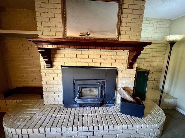 1400 Shreveport St, Elysian Fields, TX 75642 - detailed view of a brick fireplace, carpet, and a textured ceiling