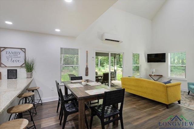 299 Southshore Dr, Lone Star, TX 75668 - dining space featuring dark wood-style floors, high vaulted ceiling, baseboards, a wall mounted air conditioner, and recessed lighting